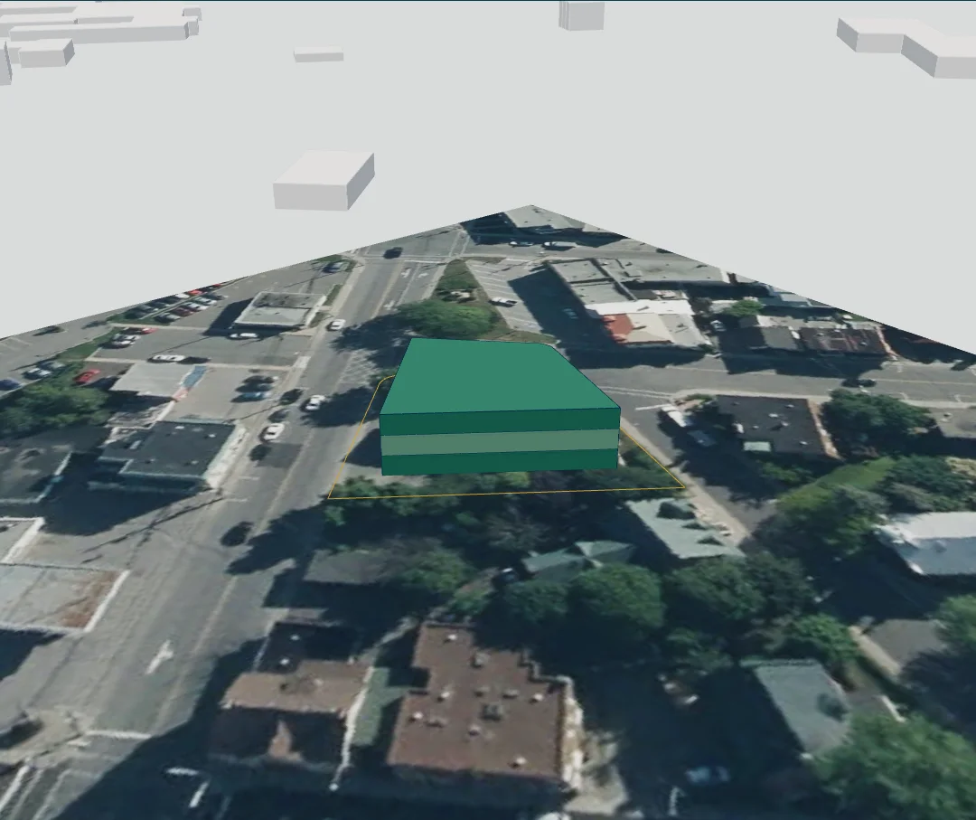 Maquette du site Girouard : volume de trois niveaux posé sur le terrain et son contexte urbain.